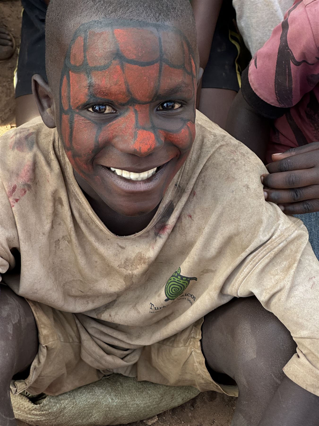 Face painting activity during a Bwaise community event